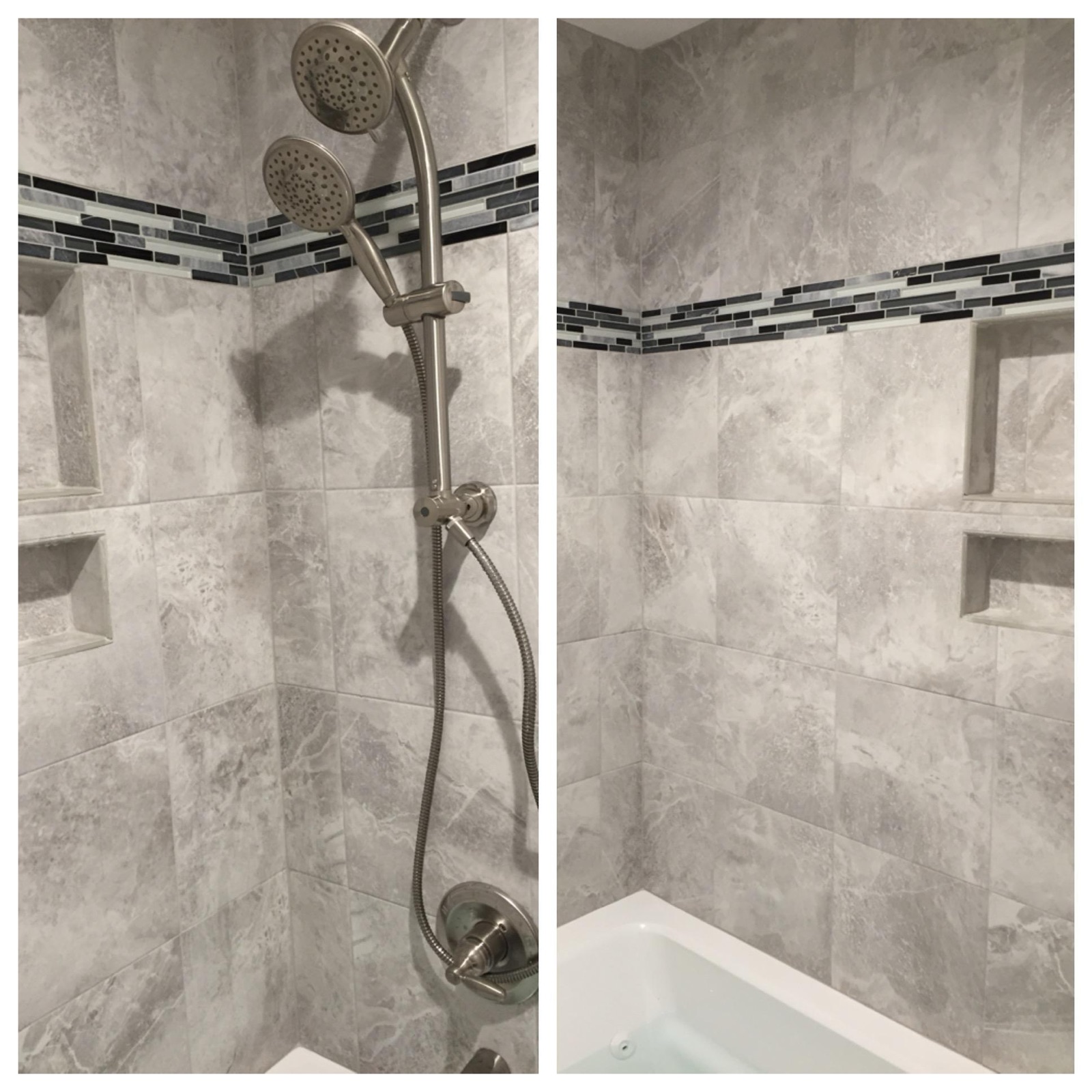 A gray stone-look tiled shower and tub surround with a glass mosaic accent band, built-in niches and a brushed-nickel shower system.